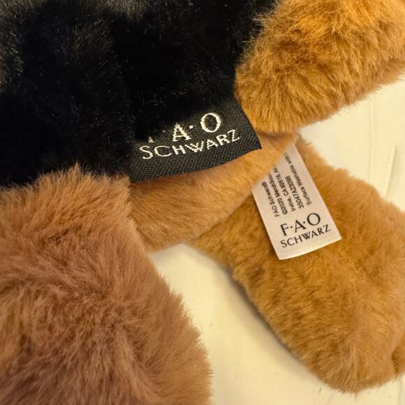 The FAO Schwartz Adopt A Pets 15" Toy Plush Lying German Shepherd - Picture 9 of 9